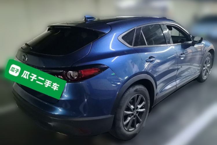 Used Mazda CX-4 2021 2.0L Automatic Two-Wheel Drive Blue Sky Dynamic Edition Rear Right 45 Deg