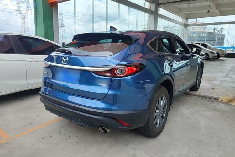 Used Mazda CX-4 2021 2.0L Automatic Two-Wheel Drive Blue Sky Exploration Edition Rear Right 45 Deg