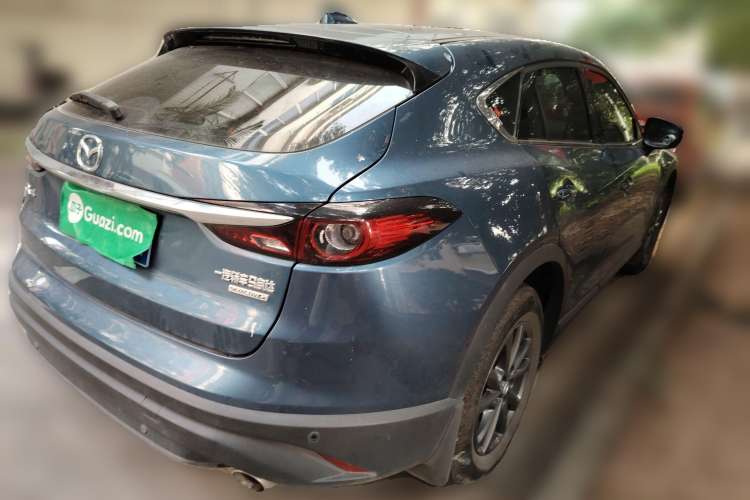 Used Mazda CX-4 2021 2.0L Automatic Two-Wheel Drive Blue Sky Dynamic Edition Rear Right 45 Deg