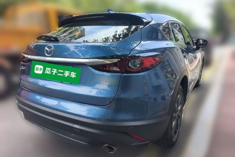 Used Mazda CX-4 2021 2.0L Automatic Two-Wheel Drive Blue Sky Dynamic Edition Rear Right 45 Deg