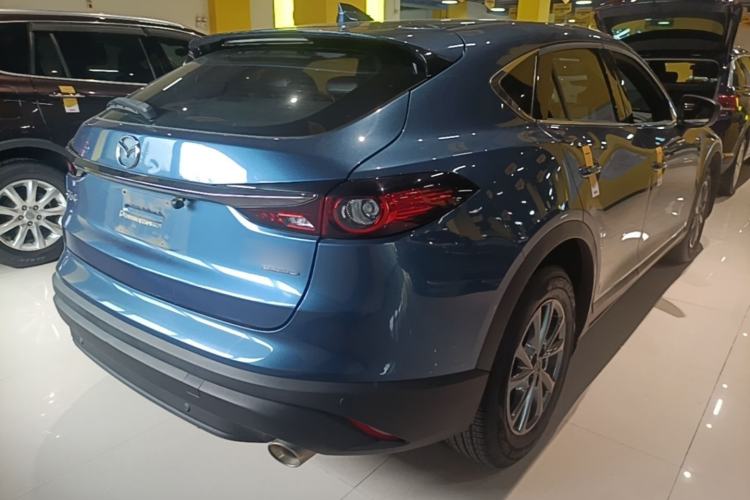Used Mazda CX-4 2021 2.0L Automatic Two-Wheel Drive Blue Sky Dynamic Edition Rear Right 45 Deg