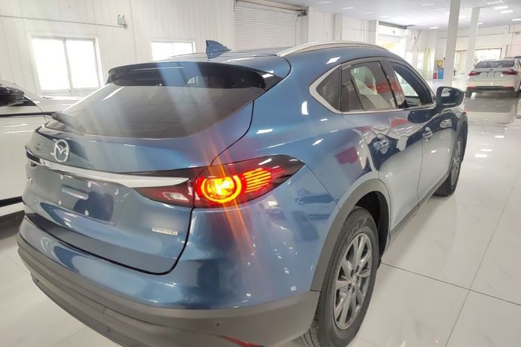 Used Mazda CX-4 2021 2.0L Automatic Two-Wheel Drive Blue Sky Luxury Edition Rear Right 45 Deg