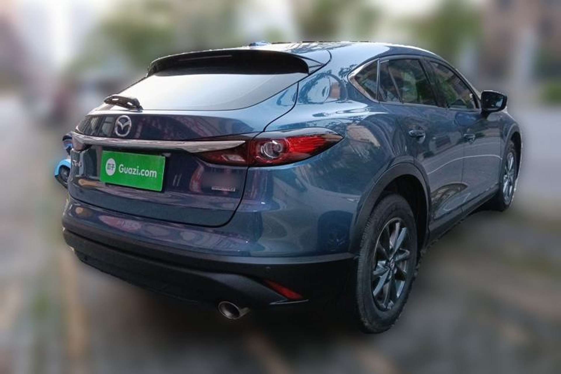Used Mazda CX-4 2021 2.0L Automatic Two-Wheel Drive Blue Sky Exploration Edition Rear Right 45 Deg