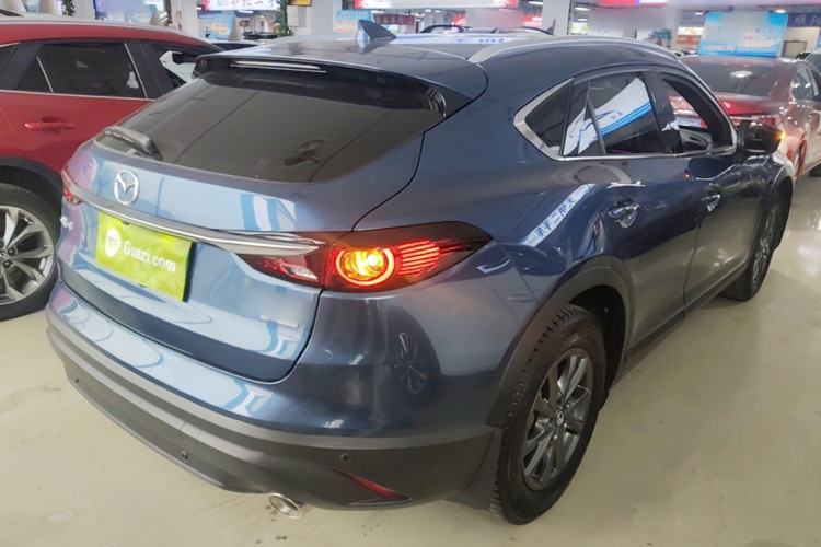 Used Mazda CX-4 2021 2.0L Automatic Two-Wheel Drive Blue Sky Dynamic Edition Rear Right 45 Deg