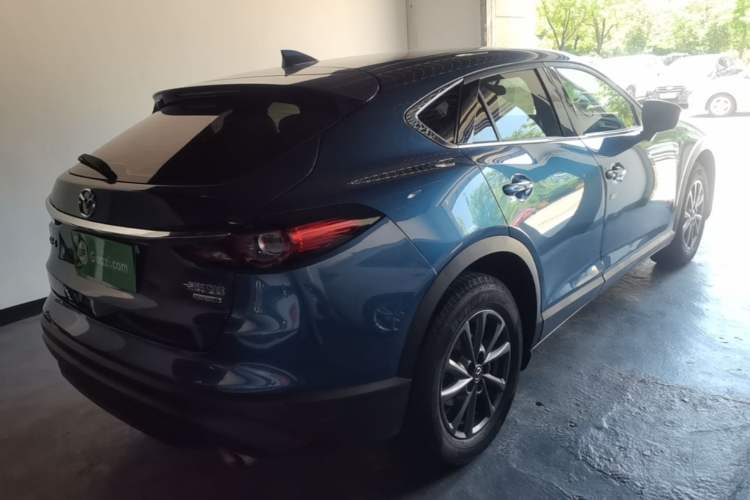 Used Mazda CX-4 2021 2.0L Automatic Two-Wheel Drive Blue Sky Exploration Edition Rear Right 45 Deg