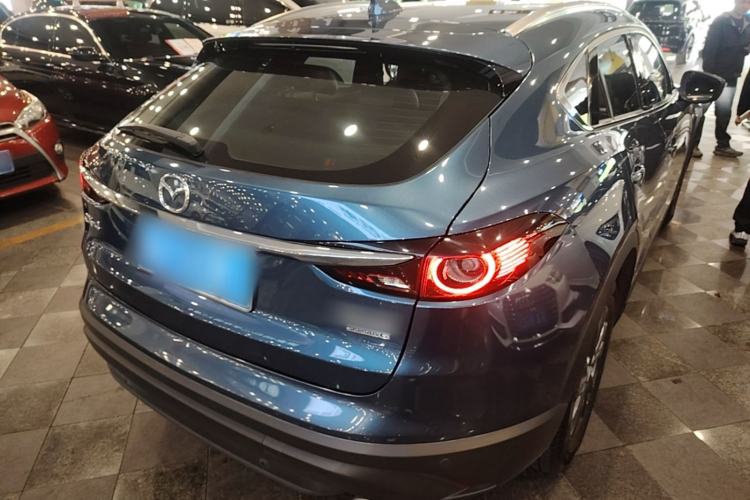 Used Mazda CX-4 2021 2.0L Automatic Two-Wheel Drive Blue Sky Luxury Edition Rear Right 45 Deg