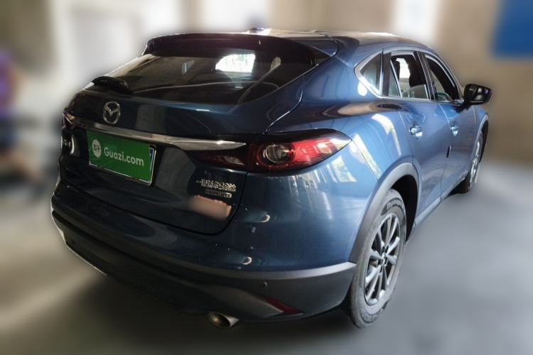 Used Mazda CX-4 2021 2.0L Automatic Two-Wheel Drive Blue Sky Dynamic Edition Rear Right 45 Deg