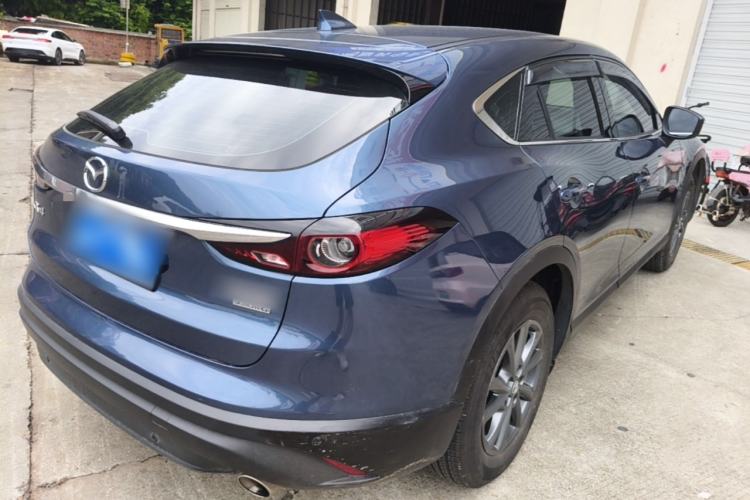 Used Mazda CX-4 2021 2.0L Automatic Two-Wheel Drive Blue Sky Exploration Edition Rear Right 45 Deg
