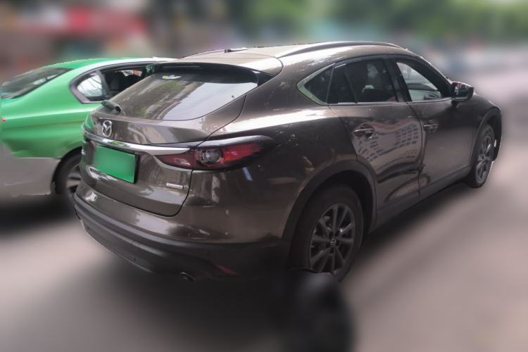 Used Mazda CX-4 2021 2.0L Automatic Two-Wheel Drive Blue Sky Luxury Edition Rear Right 45 Deg