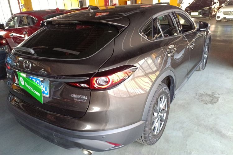 Used Mazda CX-4 2021 2.0L Automatic Two-Wheel Drive Blue Sky Dynamic Edition Rear Right 45 Deg