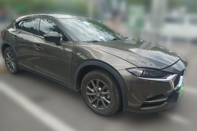 Used Mazda CX-4 2021 2.0L Automatic Two-Wheel Drive Blue Sky Exploration Edition Front Right 45 Deg