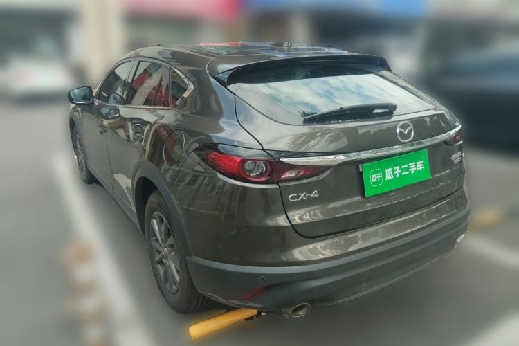 Used Mazda CX-4 2021 2.0L Automatic Two-Wheel Drive Blue Sky Exploration Edition Rear Left 45 Deg