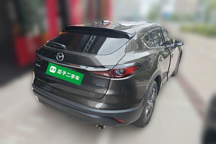 Used Mazda CX-4 2021 2.0L Automatic Two-Wheel Drive Blue Sky Dynamic Edition Rear Right 45 Deg