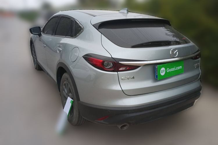 Used Mazda CX-4 2021 2.0L Automatic Two-Wheel Drive Blue Sky Dynamic Edition Rear Left 45 Deg