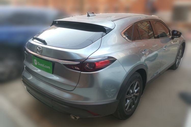 Used Mazda CX-4 2021 2.0L Automatic Two-Wheel Drive Blue Sky Dynamic Edition Rear Right 45 Deg