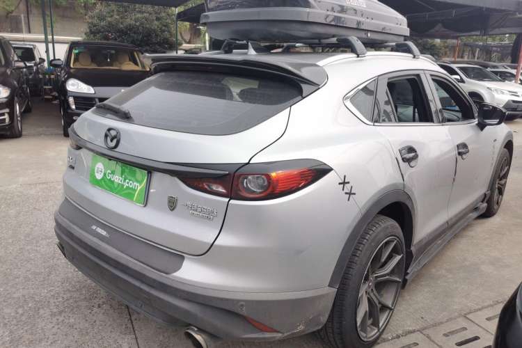 Used Mazda CX-4 2021 2.0L Automatic Two-Wheel Drive Blue Sky Dynamic Edition Rear Right 45 Deg