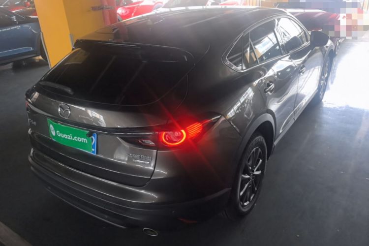 Used Mazda CX-4 2021 2.0L Automatic Two-Wheel Drive Blue Sky Dynamic Edition Rear Right 45 Deg