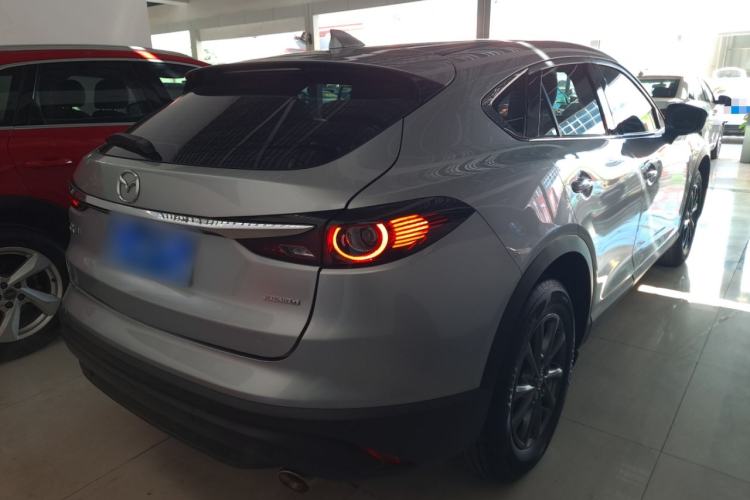 Used Mazda CX-4 2021 2.0L Automatic Two-Wheel Drive Blue Sky Dynamic Edition Rear Right 45 Deg