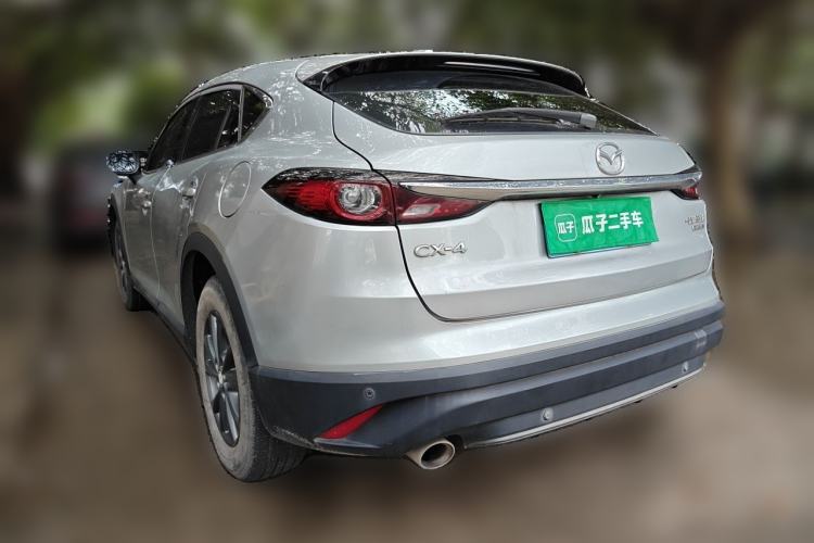 Used Mazda CX-4 2021 2.0L Automatic Two-Wheel Drive Blue Sky Exploration Edition Rear Left 45 Deg