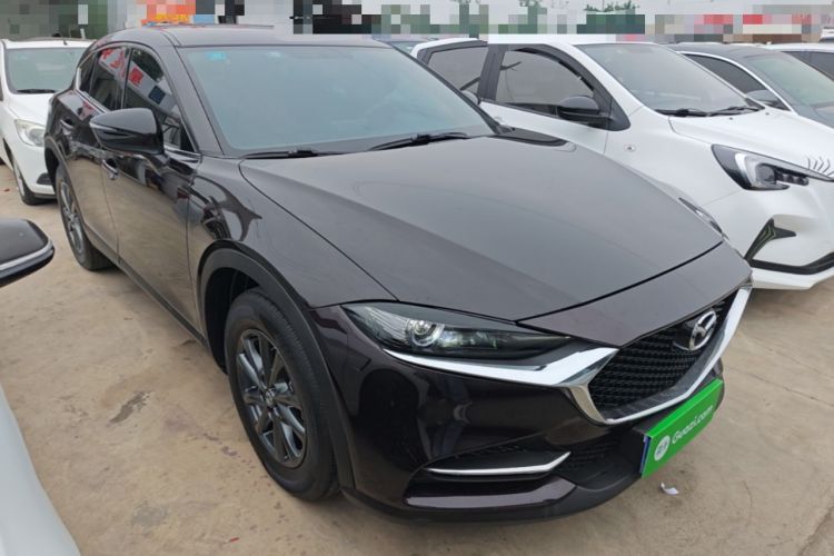 Used Mazda CX-4 2021 2.0L Automatic Two-Wheel Drive Blue Sky Dynamic Edition Front Right 45 Deg