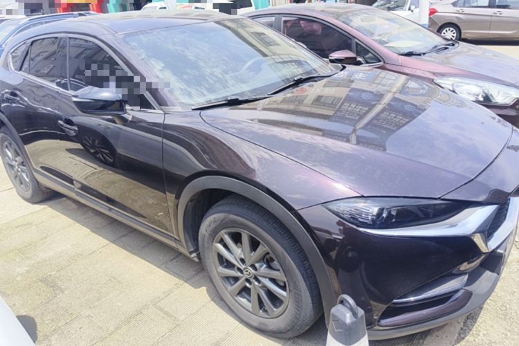 Used Mazda CX-4 2021 2.0L Automatic Two-Wheel Drive Blue Sky Dynamic Edition Front Right 45 Deg