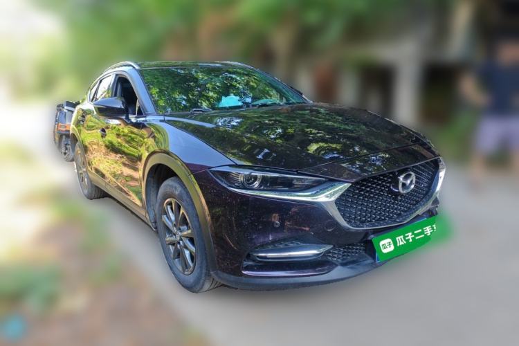 Used Mazda CX-4 2021 2.0L Automatic Two-Wheel Drive Blue Sky Luxury Edition Front Right 45 Deg