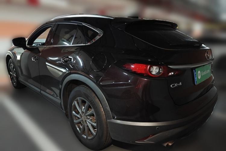 Used Mazda CX-4 2021 2.0L Automatic Two-Wheel Drive Blue Sky Luxury Edition Rear Left 45 Deg