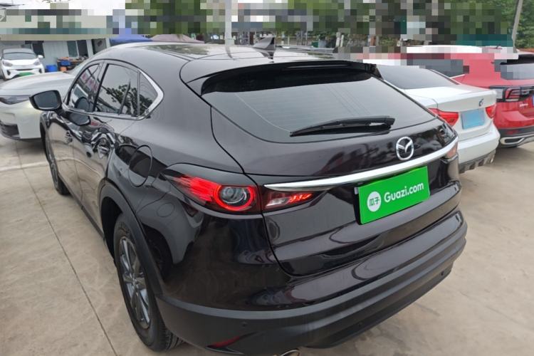 Used Mazda CX-4 2021 2.0L Automatic Two-Wheel Drive Blue Sky Dynamic Edition Rear Left 45 Deg