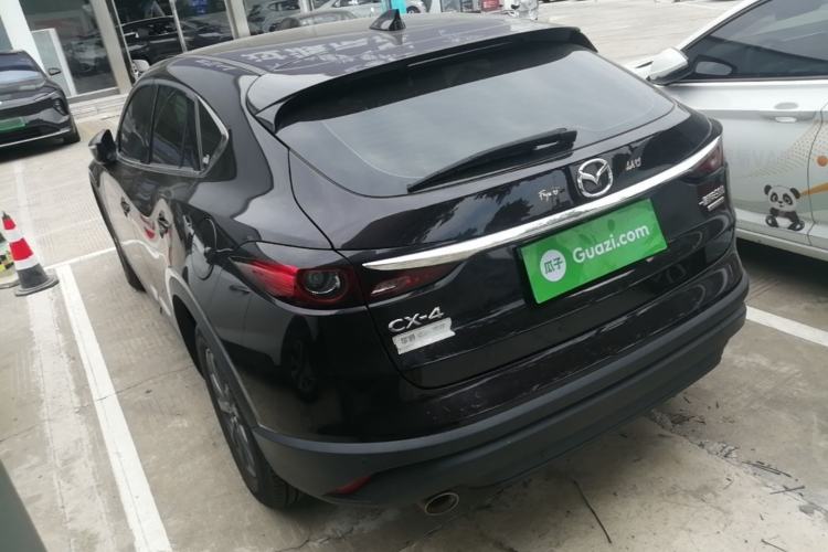 Used Mazda CX-4 2021 2.0L Automatic Two-Wheel Drive Blue Sky Exploration Edition Rear Left 45 Deg
