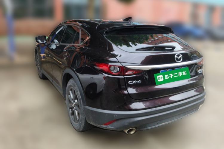 Used Mazda CX-4 2021 2.0L Automatic Two-Wheel Drive Blue Sky Dynamic Edition Rear Left 45 Deg