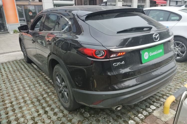 Used Mazda CX-4 2021 2.0L Automatic Two-Wheel Drive Blue Sky Exploration Edition Rear Left 45 Deg