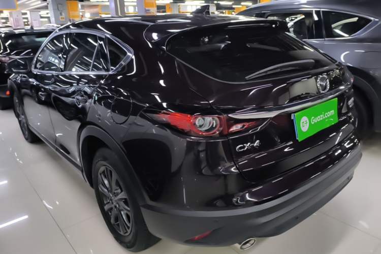 Used Mazda CX-4 2021 2.0L Automatic Two-Wheel Drive Blue Sky Exploration Edition Rear Left 45 Deg