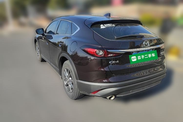 Used Mazda CX-4 2021 2.0L Automatic Two-Wheel Drive Blue Sky Dynamic Edition Rear Left 45 Deg