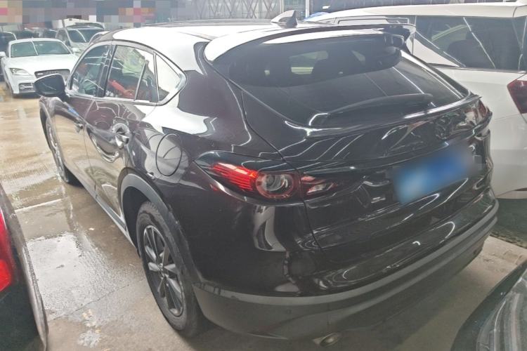 Used Mazda CX-4 2021 2.0L Automatic Two-Wheel Drive Blue Sky Dynamic Edition Rear Left 45 Deg