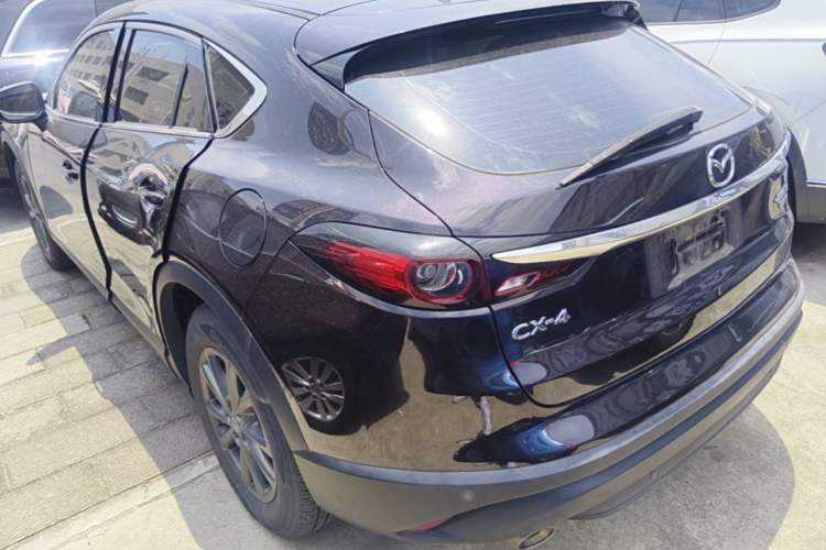 Used Mazda CX-4 2021 2.0L Automatic Two-Wheel Drive Blue Sky Dynamic Edition Rear Left 45 Deg