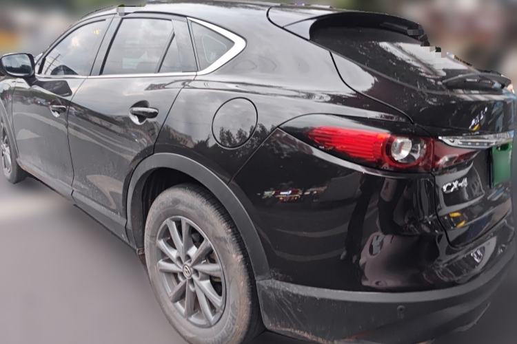 Used Mazda CX-4 2021 2.0L Automatic Two-Wheel Drive Blue Sky Dynamic Edition Rear Left 45 Deg
