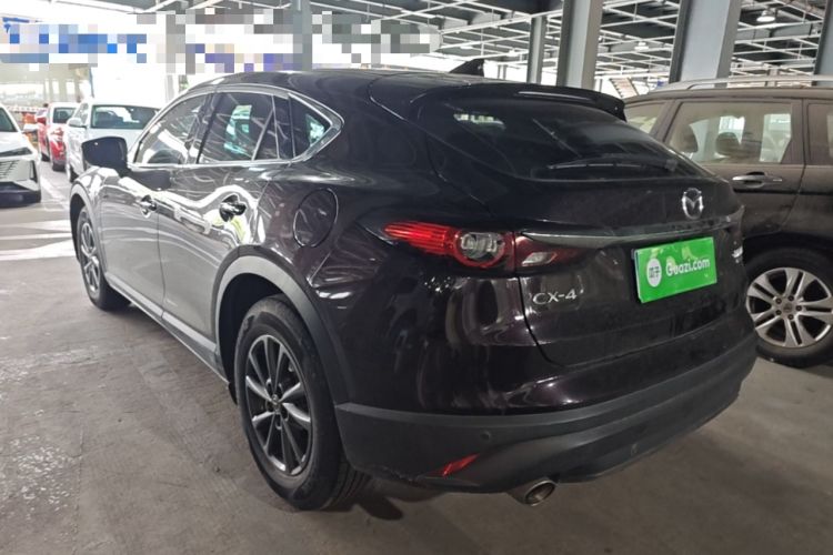 Used Mazda CX-4 2021 2.0L Automatic Two-Wheel Drive Blue Sky Dynamic Edition Rear Left 45 Deg
