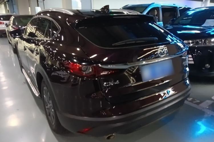 Used Mazda CX-4 2021 2.0L Automatic Two-Wheel Drive Blue Sky Exploration Edition Rear Left 45 Deg