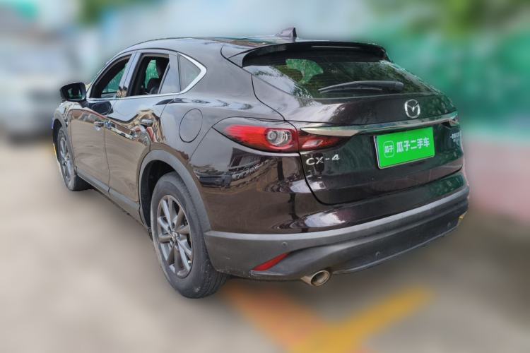 Used Mazda CX-4 2021 2.0L Automatic Two-Wheel Drive Blue Sky Dynamic Edition Rear Left 45 Deg