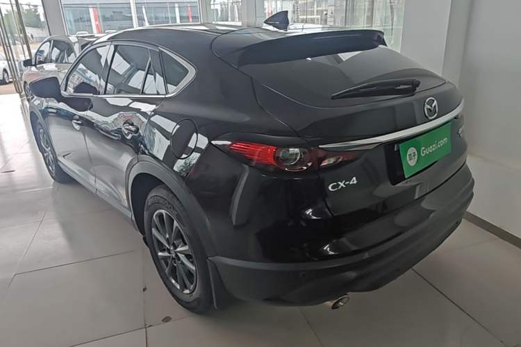 Used Mazda CX-4 2021 2.0L Automatic Two-Wheel Drive Blue Sky Dynamic Edition Rear Left 45 Deg