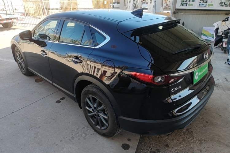 Used Mazda CX-4 2021 2.0L Automatic Two-Wheel Drive Blue Sky Exploration Edition Rear Left 45 Deg
