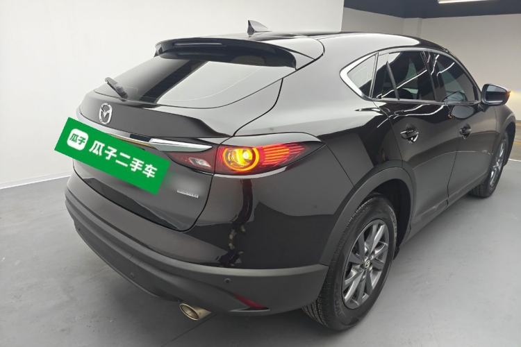 Used Mazda CX-4 2021 2.0L Automatic Two-Wheel Drive Blue Sky Exploration Edition Rear Right 45 Deg