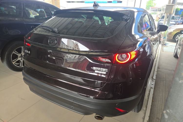 Used Mazda CX-4 2021 2.0L Automatic Two-Wheel Drive Blue Sky Exploration Edition Rear Right 45 Deg