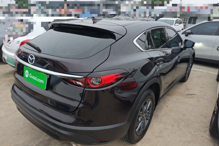 Used Mazda CX-4 2021 2.0L Automatic Two-Wheel Drive Blue Sky Dynamic Edition Rear Right 45 Deg