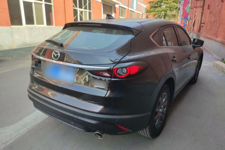 Used Mazda CX-4 2021 2.0L Automatic Two-Wheel Drive Blue Sky Exploration Edition Rear Right 45 Deg