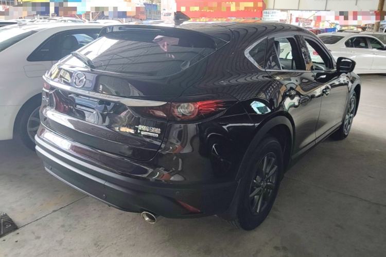 Used Mazda CX-4 2021 2.0L Automatic Two-Wheel Drive Blue Sky Dynamic Edition Rear Right 45 Deg
