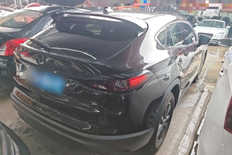 Used Mazda CX-4 2021 2.0L Automatic Two-Wheel Drive Blue Sky Dynamic Edition Rear Right 45 Deg