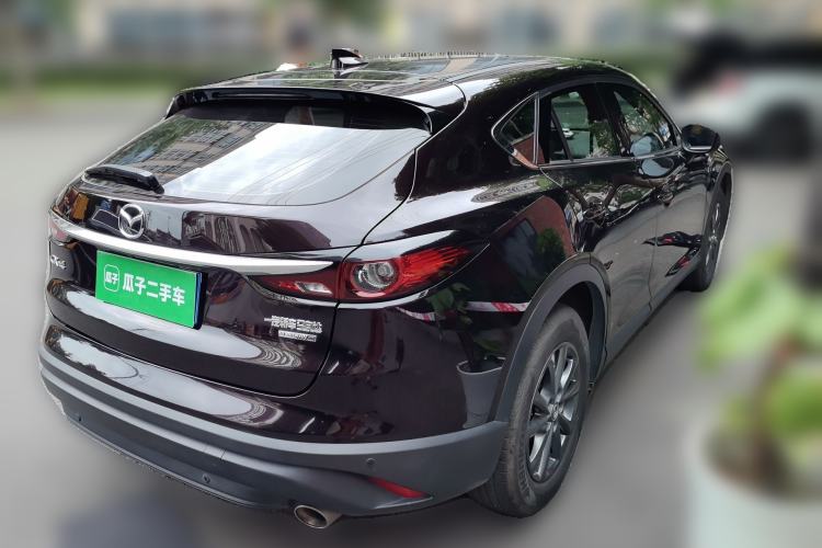 Used Mazda CX-4 2021 2.0L Automatic Two-Wheel Drive Blue Sky Exploration Edition Rear Right 45 Deg