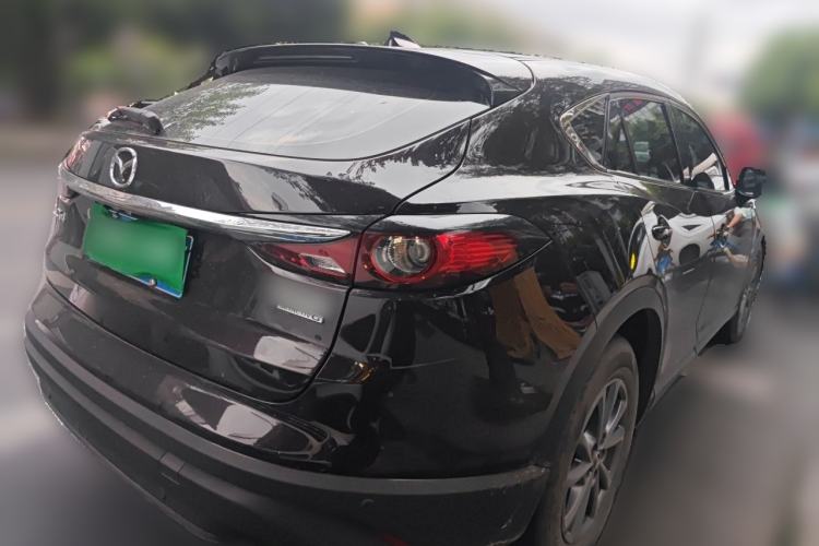 Used Mazda CX-4 2021 2.0L Automatic Two-Wheel Drive Blue Sky Dynamic Edition Rear Right 45 Deg