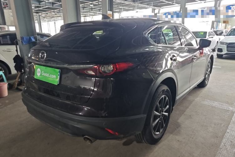 Used Mazda CX-4 2021 2.0L Automatic Two-Wheel Drive Blue Sky Dynamic Edition Rear Right 45 Deg